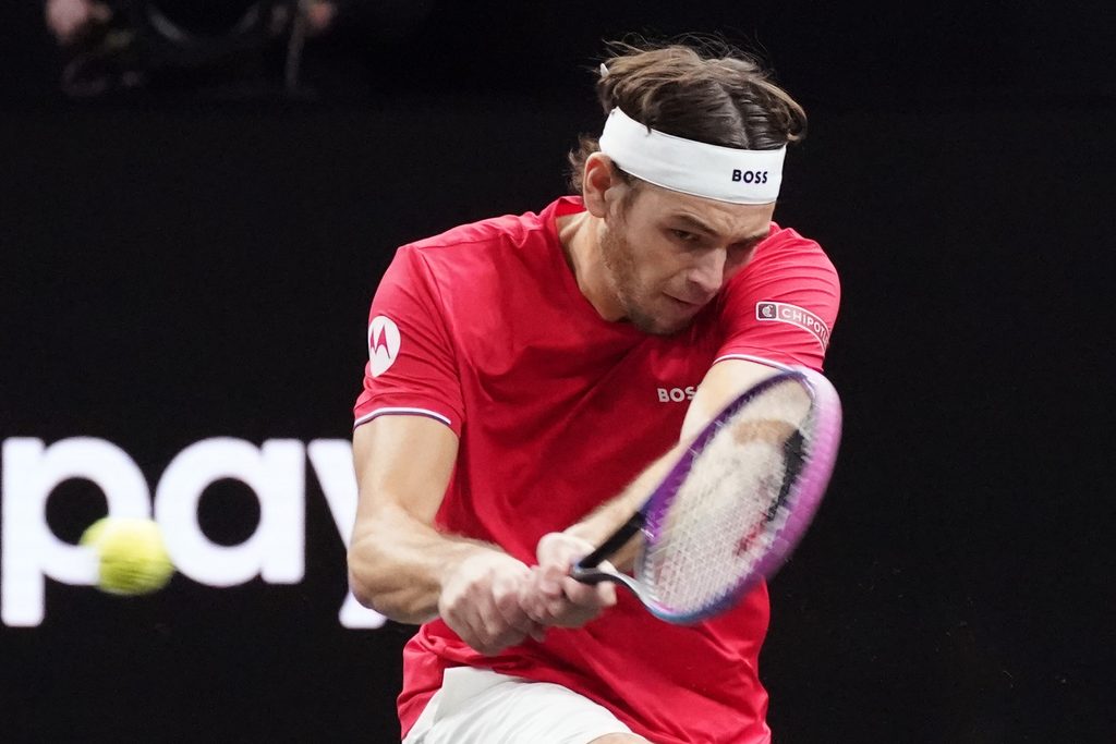Sep 21, 2025; San Francisco, CA, USA;  Team World player Taylor Fritz returns the ball from Team Europe player Alexander Zverev during the Laver Cup at Chase Center. Mandatory Credit: David Gonzales-Imagn Images