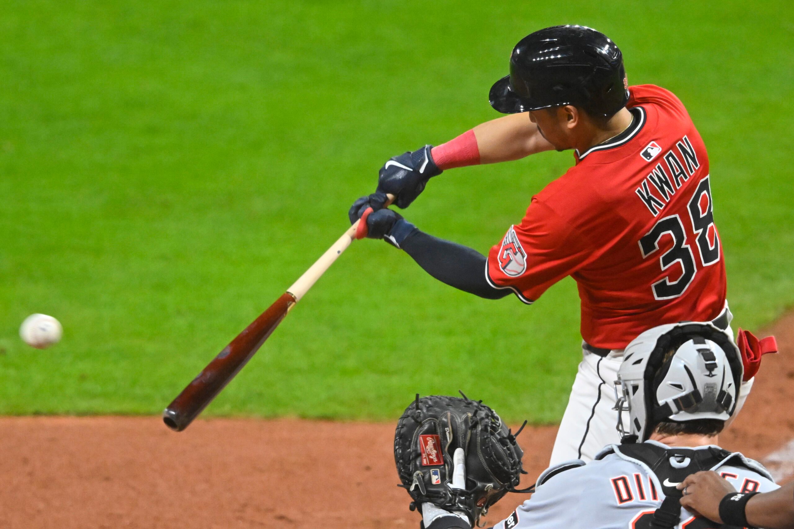 Sep 23, 2025; Cleveland, Ohio, USA; Cleveland Guardians left fielder Steven Kwan (38) doubles in the seventh inning against the Detroit Tigers at Progressive Field. Mandatory Credit: David Richard-Imagn Images