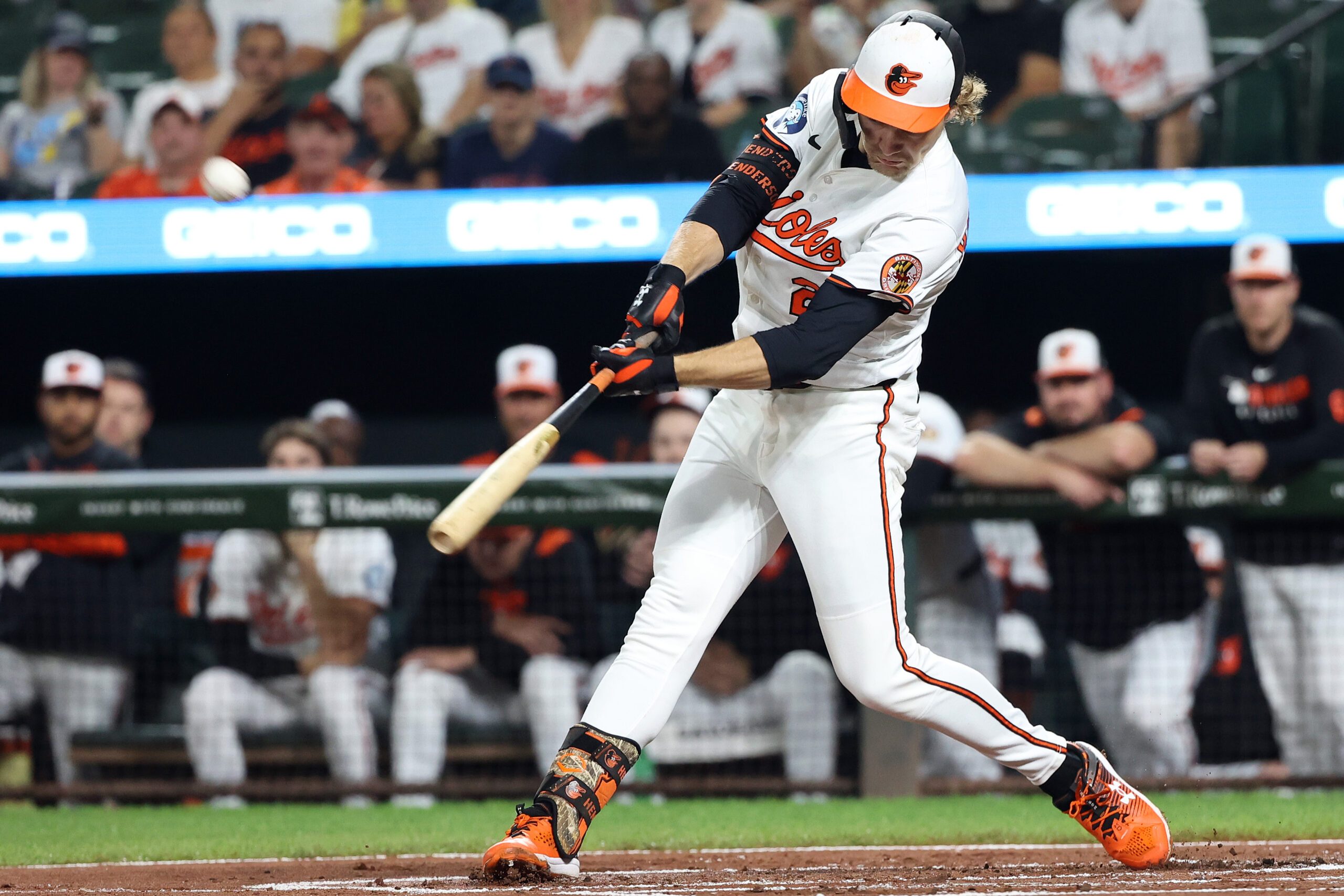 Sep 23, 2025; Baltimore, Maryland, USA; Baltimore Orioles shortstop Gunnar Henderson (2) hits a sacrifice fly to score a run during the first inning against the Tampa Bay Rays at Oriole Park at Camden Yards. Mandatory Credit: Daniel Kucin Jr.-Imagn Images