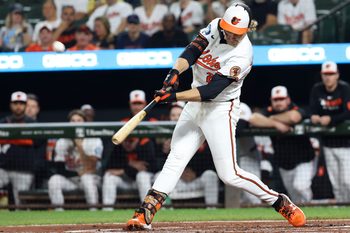 Sep 23, 2025; Baltimore, Maryland, USA; Baltimore Orioles shortstop Gunnar Henderson (2) hits a sacrifice fly to score a run during the first inning against the Tampa Bay Rays at Oriole Park at Camden Yards. Mandatory Credit: Daniel Kucin Jr.-Imagn Images