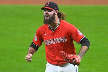 Sep 23, 2025; Cleveland, Ohio, USA; Cleveland Guardians relief pitcher Hunter Gaddis (33) reacts at the end of the eighth inning against the Detroit Tigers at Progressive Field. Mandatory Credit: David Richard-Imagn Images