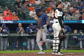 Sep 24, 2025; Baltimore, Maryland, USA; Tampa Bay Rays second baseman Richie Palacios (1) scores during the second inning on a hit by catcher Hunter Feduccia (not shown) against the Baltimore Orioles at Oriole Park at Camden Yards. Mandatory Credit: Mitch Stringer-Imagn Images
