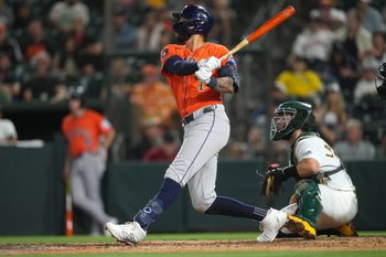 Sep 24, 2025; West Sacramento, California, USA; Houston Astros shortstop Carlos Correa (1) hits a double against the Athletics in the ninth inning at Sutter Health Park. Mandatory Credit: Cary Edmondson-Imagn Images