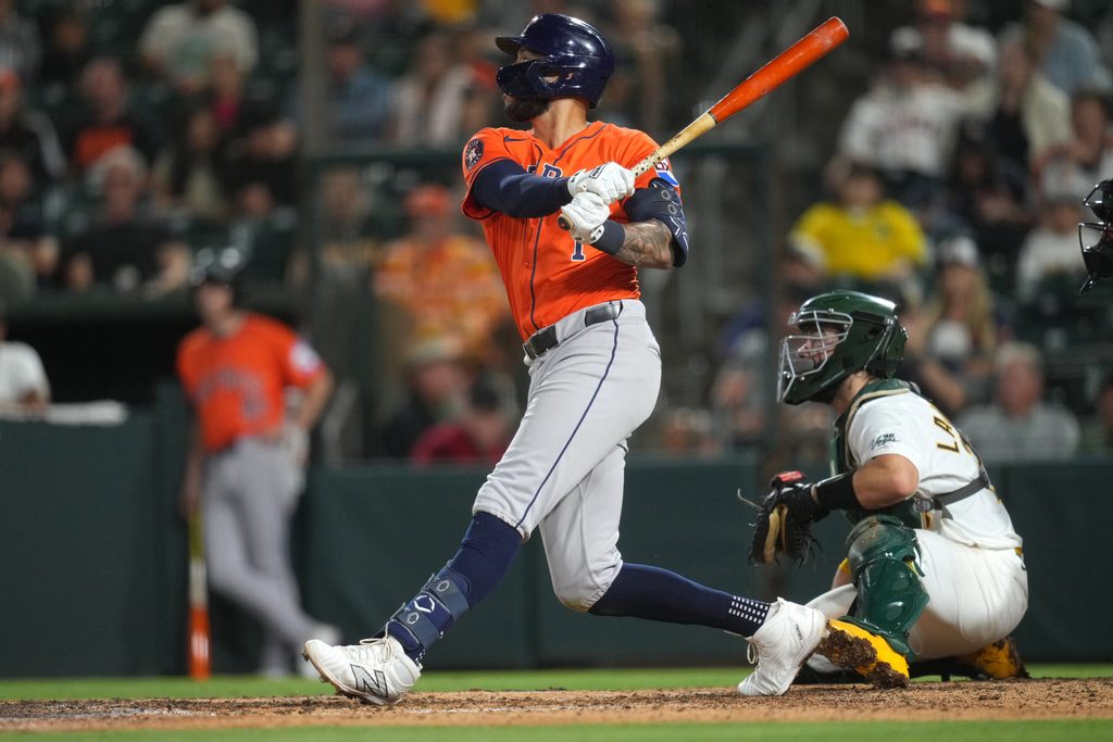 Sep 24, 2025; West Sacramento, California, USA; Houston Astros shortstop Carlos Correa (1) hits a double against the Athletics in the ninth inning at Sutter Health Park. Mandatory Credit: Cary Edmondson-Imagn Images