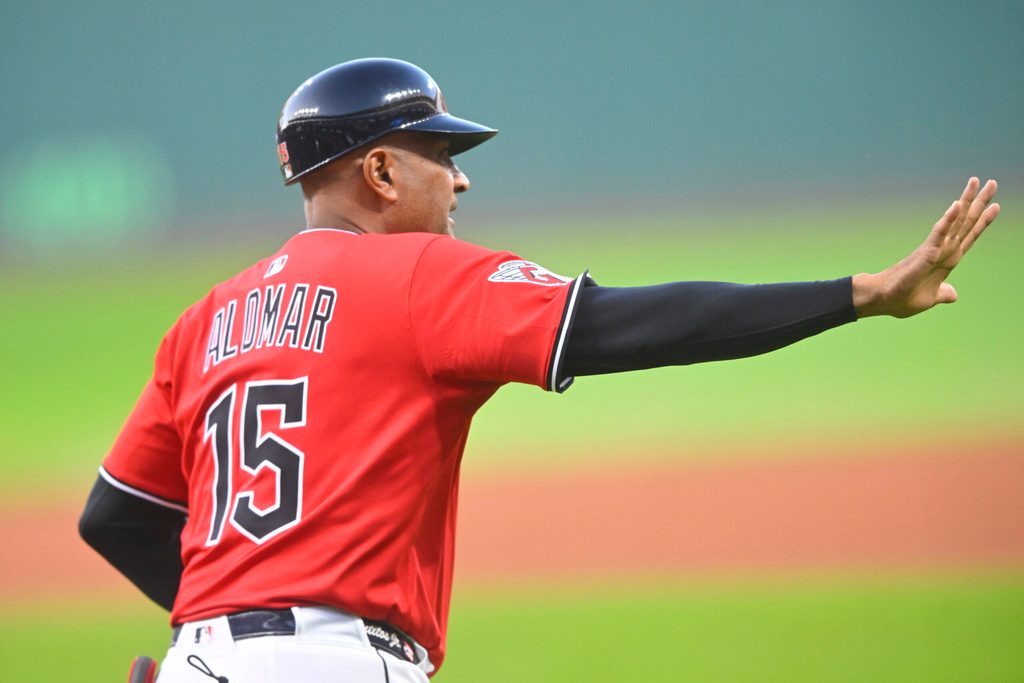 Sep 25, 2025; Cleveland, Ohio, USA; Cleveland Guardians first base coach Sandy Alomar Jr. (15) runs on the field in the first inning against the Detroit Tigers at Progressive Field. Mandatory Credit: David Richard-Imagn Images