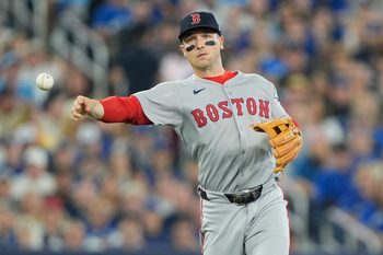 Sep 25, 2025; Toronto, Ontario, CAN; Boston Red Sox third baseman Alex Bregman (2) throws out Toronto Blue Jays catcher Tyler Heineman (not pictured) at first base during the third inning at Rogers Centre. Mandatory Credit: John E. Sokolowski-Imagn Images
