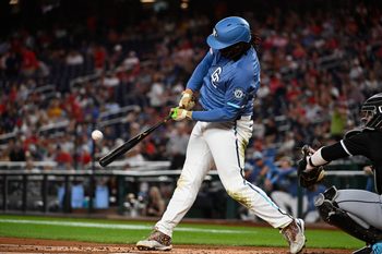 Sep 26, 2025; Washington, District of Columbia, USA; Washington Nationals first baseman Josh Bell (19) hits a solo home run against the Chicago White Sox during the first inning at Nationals Park. Mandatory Credit: Brad Mills-Imagn Images