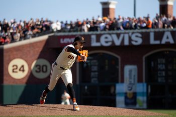 Sep 27, 2025; San Francisco, California, USA; San Francisco Giants pitcher Spencer Bivens (76) delivers a pitch against the Colorado Rockies during the ninth inning at Oracle Park. Mandatory Credit: D. Ross Cameron-Imagn Images