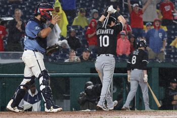 Sep 27, 2025; Washington, District of Columbia, USA; Chicago White Sox shortstop Chase Meidroth (10) reacts after striking out with a runner on third base to end the game against the Washington Nationals at Nationals Park. Mandatory Credit: Geoff Burke-Imagn Images