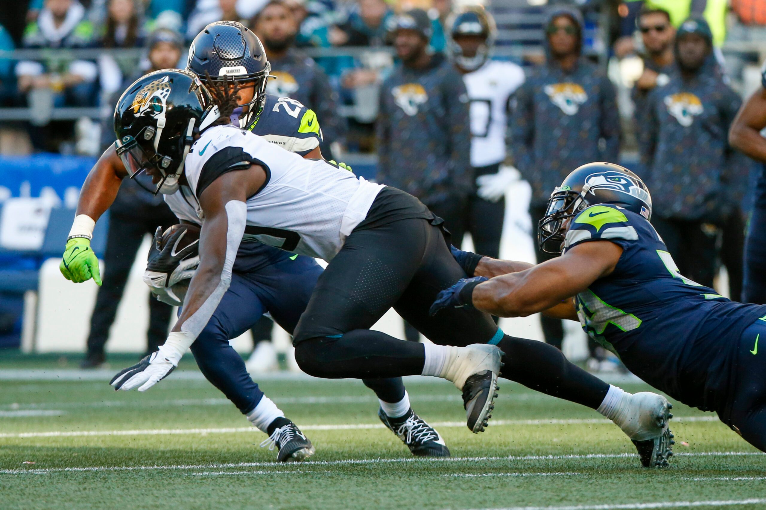 Oct 31, 2021; Seattle, Washington, USA; Jacksonville Jaguars wide receiver Laviska Shenault Jr. (10) runs for yards after the catch  as Seattle Seahawks middle linebacker Bobby Wagner (54) reaches for a tackle during the fourth quarter at Lumen Field. Mandatory Credit: Joe Nicholson-Imagn Images