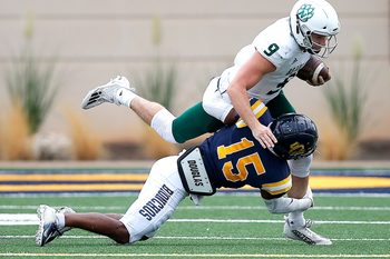 Central Oklahoma's Rae'quan Wicks tackles Northwest Missouri's Mike Hohensee during the the college football game between the University of Central Oklahoma Bronchos and the Northwest Missouri State Bearcats at the Chad Richison Stadium in Edmond, Okla., Saturday, Sept., 24, 2022. UCO beat Northwest Missouri 23 to 14.

Uco Vs Nwmsu Fb