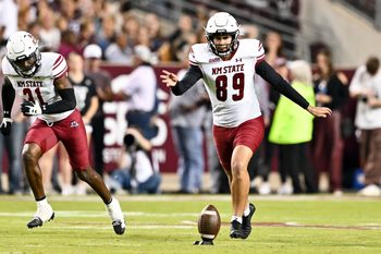 Nov 16, 2024; College Station, Texas, USA; New Mexico State Aggies place kicker Abraham Montano (89) kicks the ball during the second half against the Texas A&M Aggies at Kyle Field. Mandatory Credit: Maria Lysaker-Imagn Images