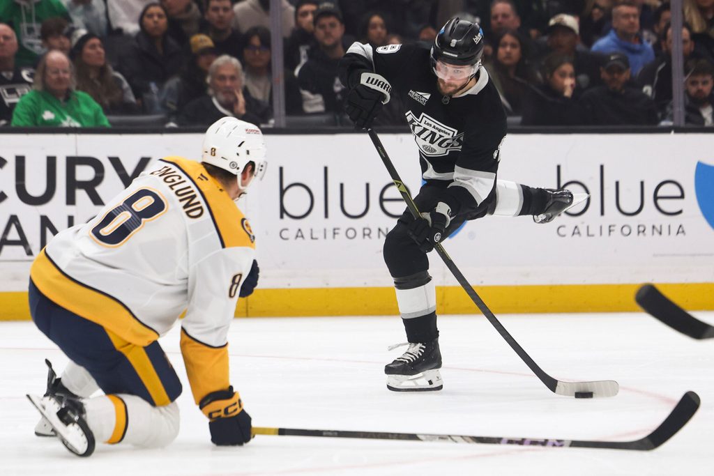 Mar 15, 2025; Los Angeles, California, USA; Los Angeles Kings right wing Adrian Kempe (9) looks to shoot against the Nashville Predators during the second period of a hockey game at Crypto.com Arena. Mandatory Credit: Jessica Alcheh-Imagn Images