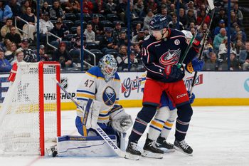 Apr 10, 2025; Columbus, Ohio, USA; Buffalo Sabres goalie James Reimer (47) makes a save as Columbus Blue Jackets left wing James van Riemsdyk (21) looks for a rebound during the second period at Nationwide Arena. Mandatory Credit: Russell LaBounty-Imagn Images