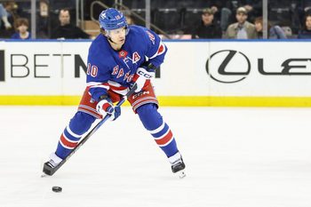Apr 17, 2025; New York, New York, USA;  New York Rangers left wing Artemi Panarin (10) attempts a shot on goal in the third period against the Tampa Bay Lightning at Madison Square Garden. Mandatory Credit: Wendell Cruz-Imagn Images