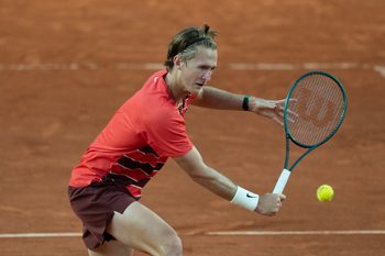 May 30, 2025; Paris, FR; Sebastian Korda of the United States returns a shot during his match against Frances Tiafoe of the United States on day six at Roland Garros Stadium.  Mandatory Credit: Susan Mullane-Imagn Images