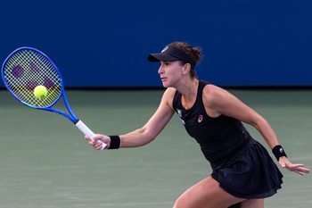 Aug 24, 2025; Flushing, NY, USA; Belinda Bencic of Switzerland in action against Zhang Shuai of China in the first round of the women’s singles at the US Open at Billie Jean King National Tennis Centre. Mandatory Credit: Mike Frey-Imagn Images