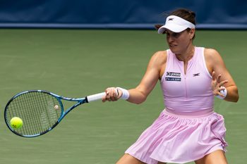 Aug 26, 2025; Flushing, NY, USA; Kimberly Birrell of Australia in action against Amanda Anisimova of the United States in the first round of the womenís singles at the US Open at Louis Armstrong Stadium in Billie Jean King National Tennis Centre. Mandatory Credit: Mike Frey-Imagn Images