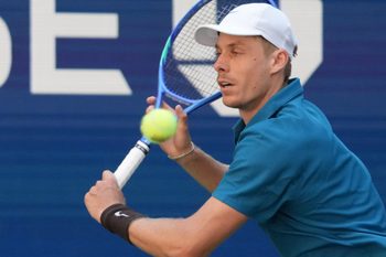 Aug 30, 2025; Flushing, NY, USA;  
Denis Shapovalov (CAN) hits to Jannik Sinner (ITA) (not pictured) on day seven of the 2025 U.S. Open tennis tournament at the USTA Billie Jean King National Tennis Center. Mandatory Credit: Robert Deutsch-Imagn Images