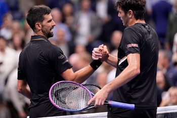 Sep 2, 2025; Flushing, NY, USA;  
Novak Djokovic (SRB) (left) after defeating Taylor Fritz (USA) (right) on day ten of the 2025 U.S. Open tennis tournament at the USTA Billie Jean King National Tennis Center. Mandatory Credit: Robert Deutsch-Imagn Images