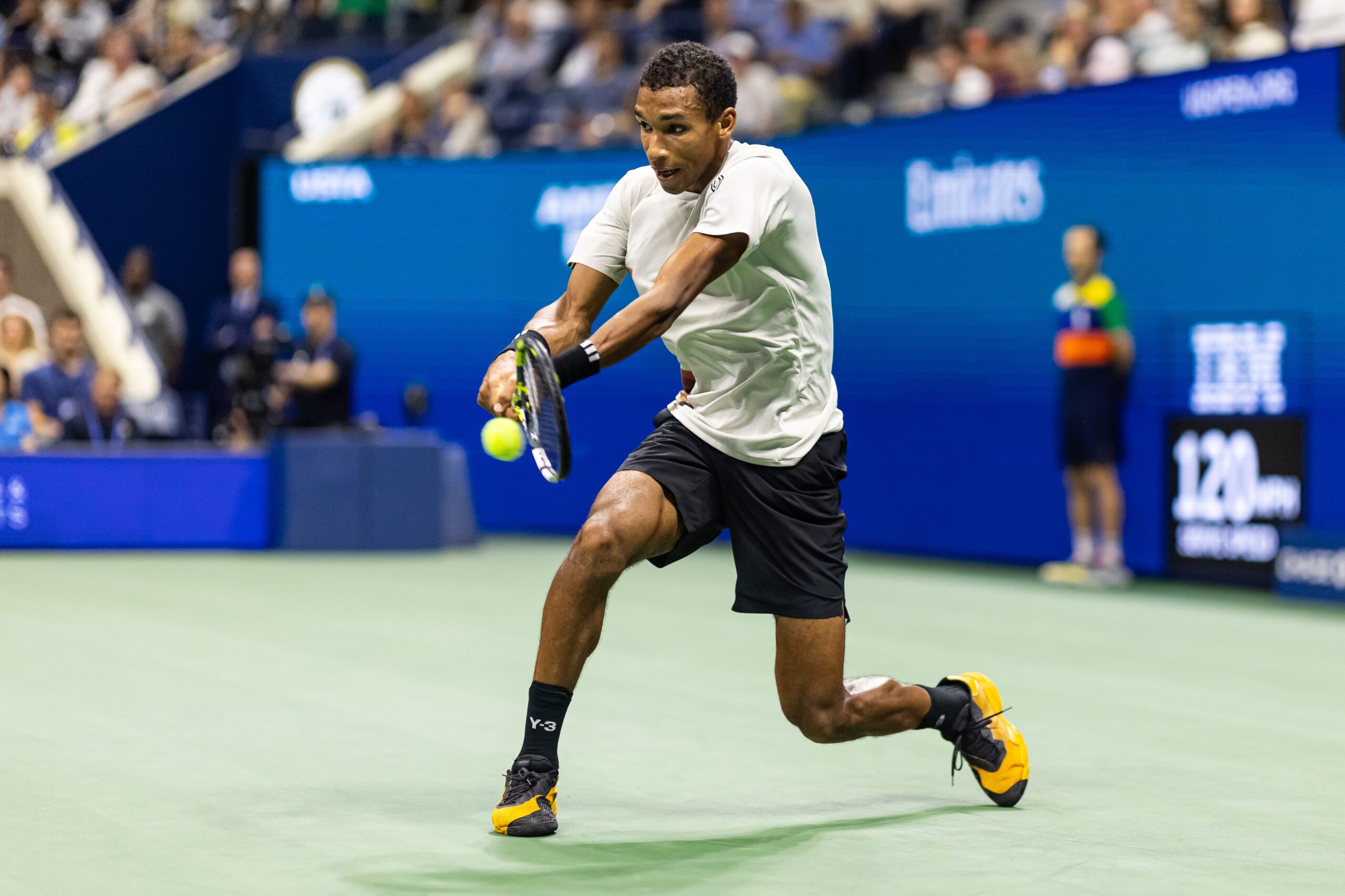 Sep 5, 2025; Flushing, NY, USA; Felix Auger-Aliassime of Canada in action against Jannik Sinner of Italy in the semifinal of the men’s singles at the US Open at Arthur Ashe Stadium in Billie Jean King National Tennis Center. Mandatory Credit: Mike Frey-Imagn Images