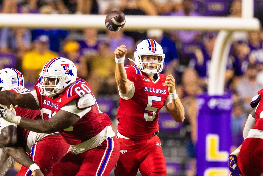 Sep 6, 2025; Baton Rouge, Louisiana, USA; Louisiana Tech Bulldogs quarterback Blake Baker (5) passes against LSU Tigers during the second half at Tiger Stadium. Mandatory Credit: Stephen Lew-Imagn Images
