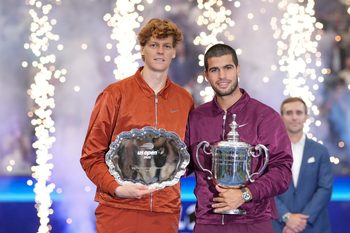Sep 7, 2025; Flushing, NY, USA;  Carlos Alcaraz (ESP) and Jannik Sinner (ITA) poses for a photo after the final of mens singles at Billie Jean King National Tennis Center. Mandatory Credit: Robert Deutsch-Imagn Images