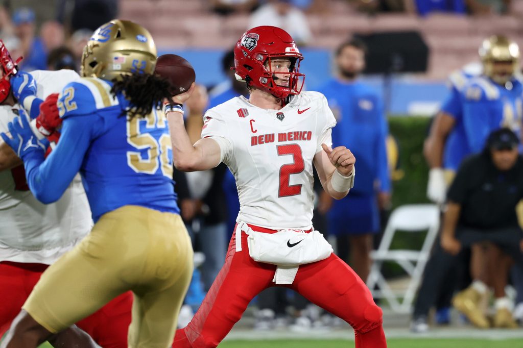 Sep 12, 2025; Pasadena, California, USA; New Mexico Lobos quarterback Jack Layne (2) throws a pass during the second quarter against the UCLA Bruins at Rose Bowl. Mandatory Credit: Kiyoshi Mio-Imagn Images