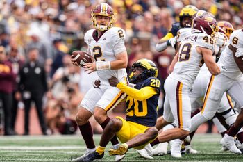 Michigan defensive back Jyaire Hill (20) sacks Central Michigan quarterback Joe Labas (2) during the first half at Michigan Stadium in Ann Arbor on Saturday, Sept. 13, 2025.