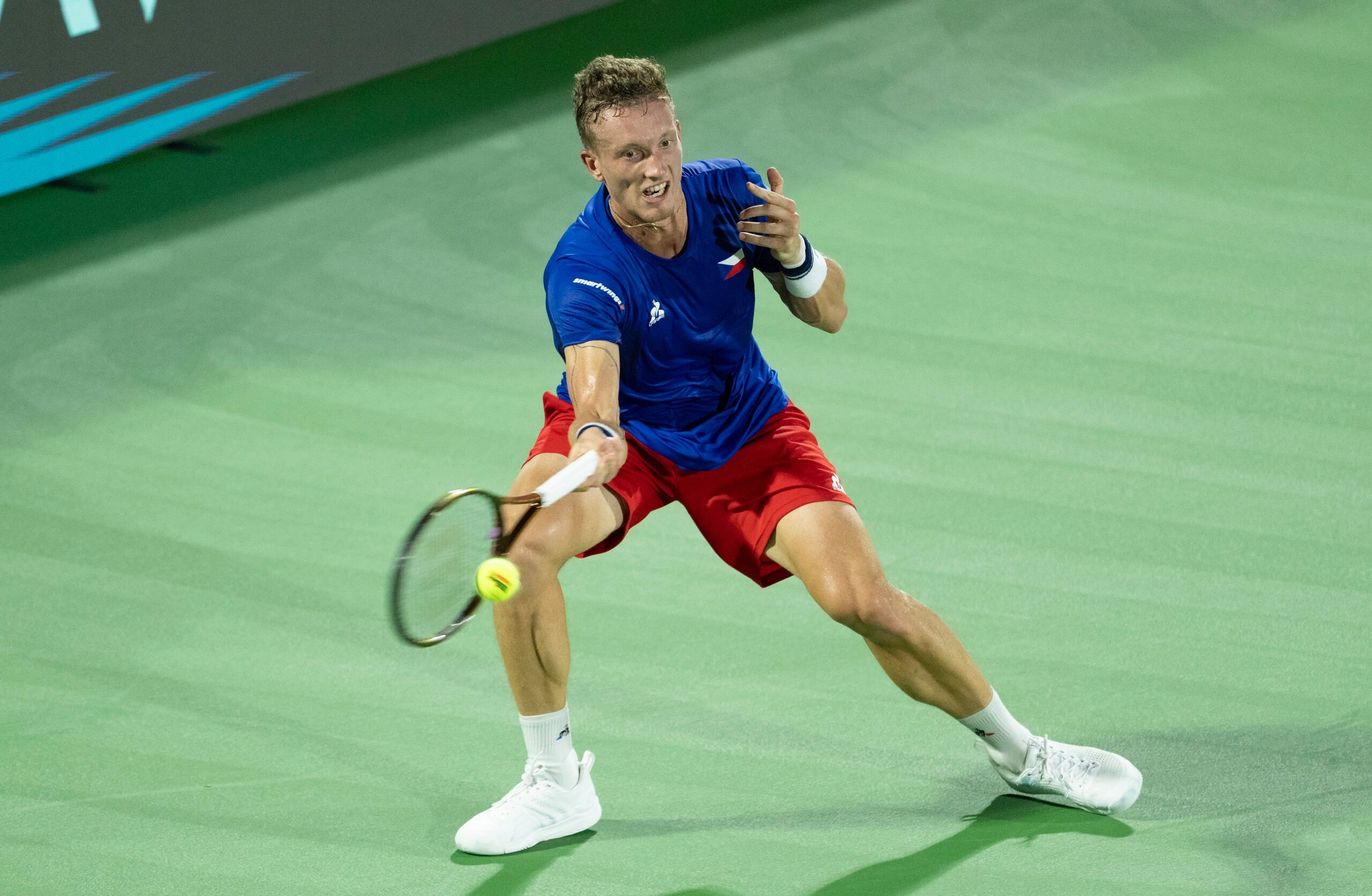 Sep 13, 2025; Delray Beach, FL, USA; Jiri Lehecka of Czechia returns a shot against Taylor Fritz of the United States in their Davis Cup match at Delray Beach Tennis Center. Mandatory Credit: Susan Mullane-Imagn Images