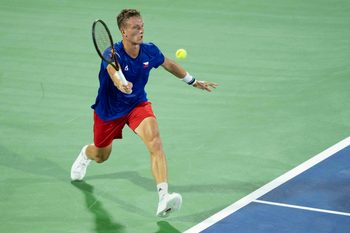 Sep 13, 2025; Delray Beach, FL, USA; Jiri Lehecka of Czechia returns a shot against Taylor Fritz of the United States in their Davis Cup match at Delray Beach Tennis Center. Mandatory Credit: Susan Mullane-Imagn Images