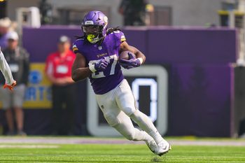 Sep 21, 2025; Minneapolis, Minnesota, USA; Minnesota Vikings running back Jordan Mason (27) carries the ball against the Cincinnati Bengals during the second half at U.S. Bank Stadium. Mandatory Credit: Brad Rempel-Imagn Images