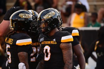 Southern Miss Golden Eagles running back Matt Jones (5) and running back Jeffery Pittman (0) react after a touchdown against the Jacksonville State Gamecocks during the first quarter at M.M. Roberts Stadium in Hattiesburg, Miss. on Sept. 27, 2025.