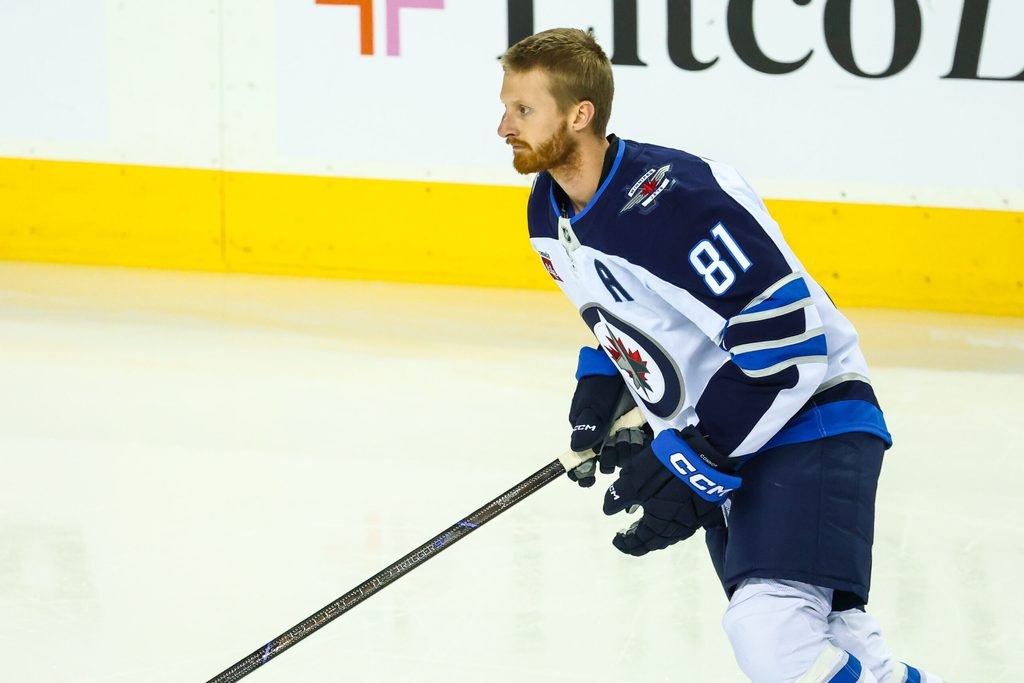 Oct 3, 2025; Calgary, Alberta, CAN; Winnipeg Jets left wing Kyle Connor (81) skates during the warmup period against the Calgary Flames at Scotiabank Saddledome. Mandatory Credit: Sergei Belski-Imagn Images