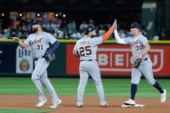 Oct 4, 2025; Seattle, Washington, USA; Detroit Tigers second baseman Gleyber Torres (25) celebrates with outfielder Kerry Carpenter (30) after defeating the Seattle Mariners during game one of the ALDS round for the 2025 MLB playoffs at T-Mobile Park. Mandatory Credit: Joe Nicholson-Imagn Images