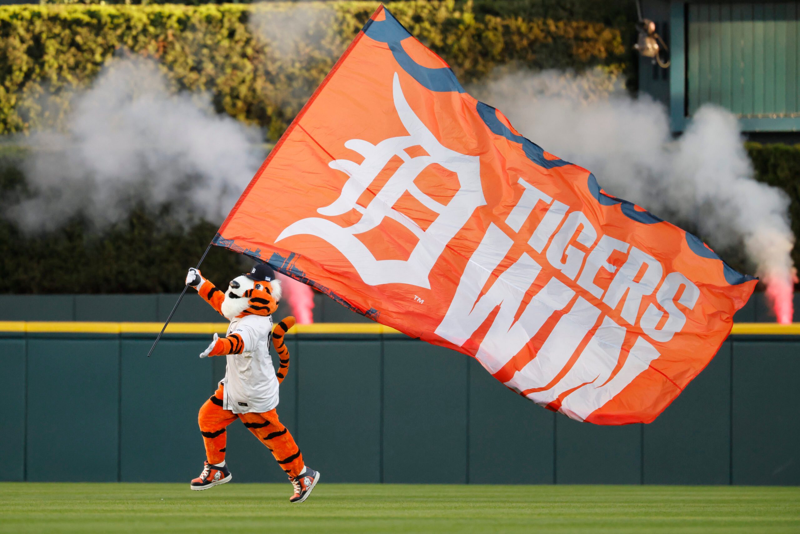 Oct 8, 2025; Detroit, Michigan, USA; PAWS the Detroit Tigers mascot celebrates the victory against the Seattle Mariners during game four of the ALDS round for the 2025 MLB playoffs at Comerica Park. Mandatory Credit: Rick Osentoski-Imagn Images