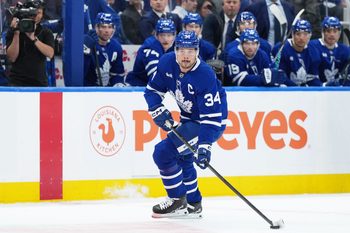 Oct 8, 2025; Toronto, Ontario, CAN; Toronto Maple Leafs center Auston Matthews (34) skates with the puck against the Montreal Canadiens during the first period at Scotiabank Arena. Mandatory Credit: Nick Turchiaro-Imagn Images