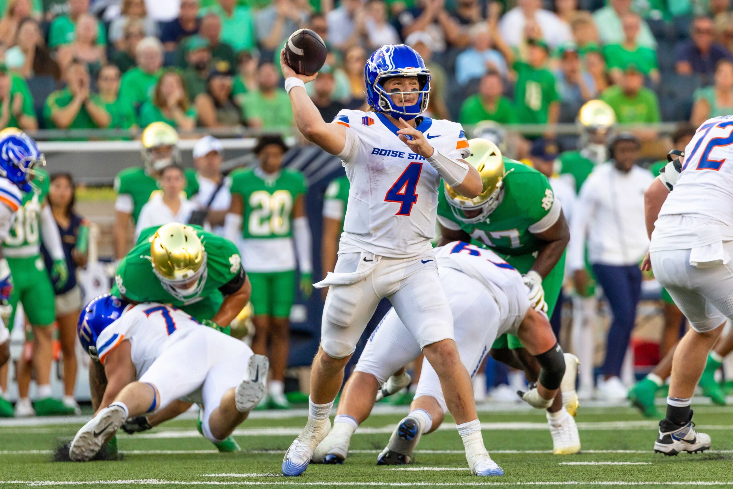 Oct 4, 2025; South Bend, Indiana, USA; Boise State Broncos quarterback Maddux Madsen (4) throws a pass against the Notre Dame Fighting Irish at Notre Dame Stadium. Mandatory Credit: Michael Caterina-Imagn Images
