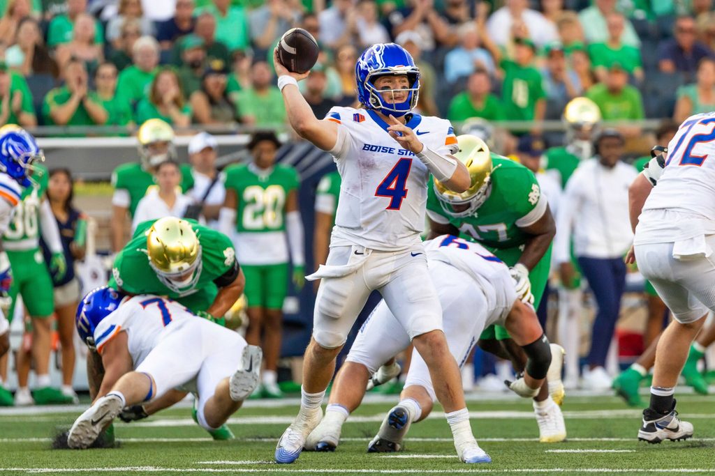 Oct 4, 2025; South Bend, Indiana, USA; Boise State Broncos quarterback Maddux Madsen (4) throws a pass against the Notre Dame Fighting Irish at Notre Dame Stadium. Mandatory Credit: Michael Caterina-Imagn Images