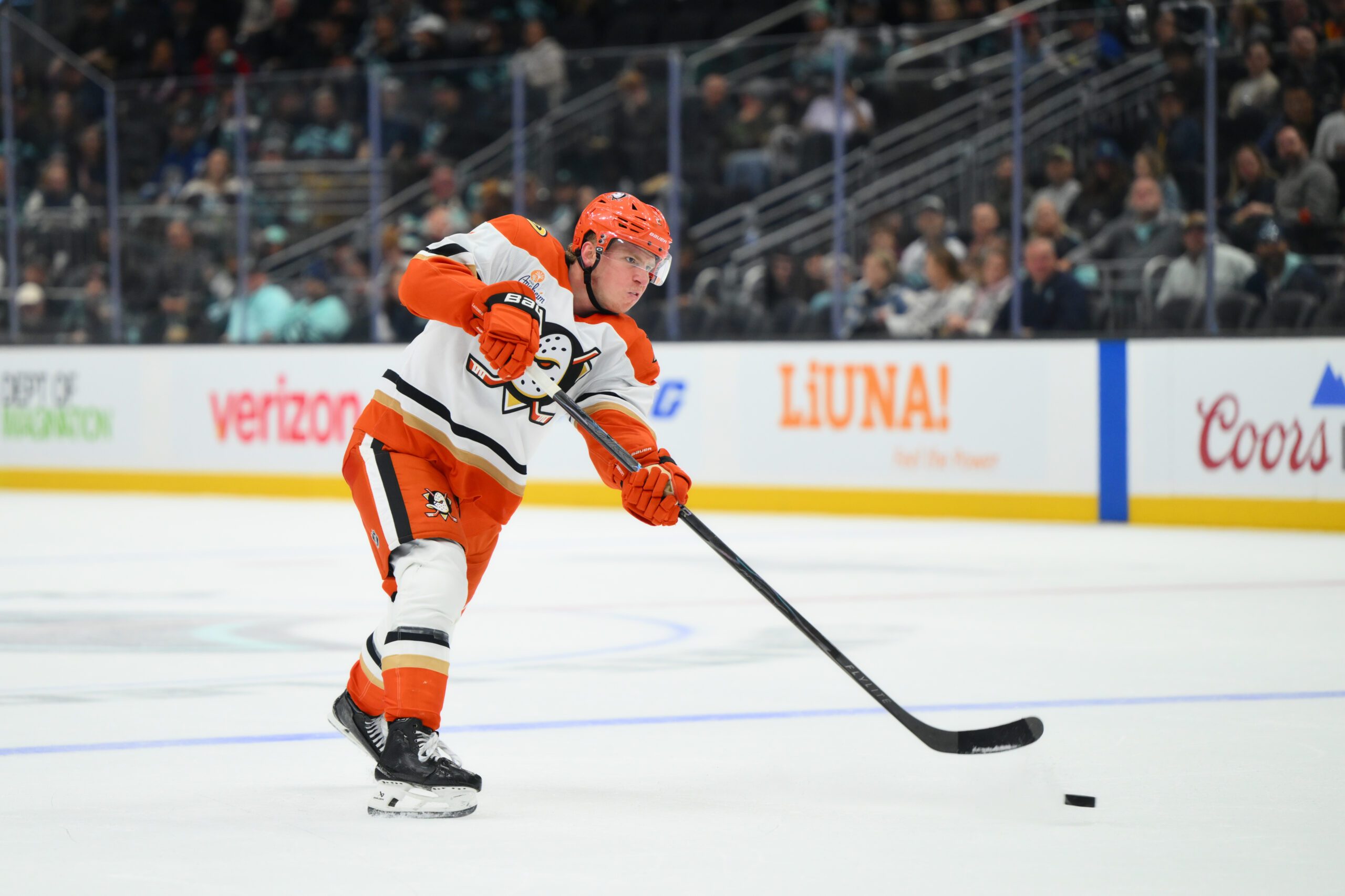 Oct 9, 2025; Seattle, Washington, USA; Anaheim Ducks defenseman Jackson LaCombe (2) shoots the puck against the Seattle Kraken during the third period at Climate Pledge Arena. Mandatory Credit: Steven Bisig-Imagn Images