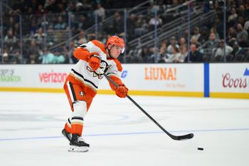 Oct 9, 2025; Seattle, Washington, USA; Anaheim Ducks defenseman Jackson LaCombe (2) shoots the puck against the Seattle Kraken during the third period at Climate Pledge Arena. Mandatory Credit: Steven Bisig-Imagn Images