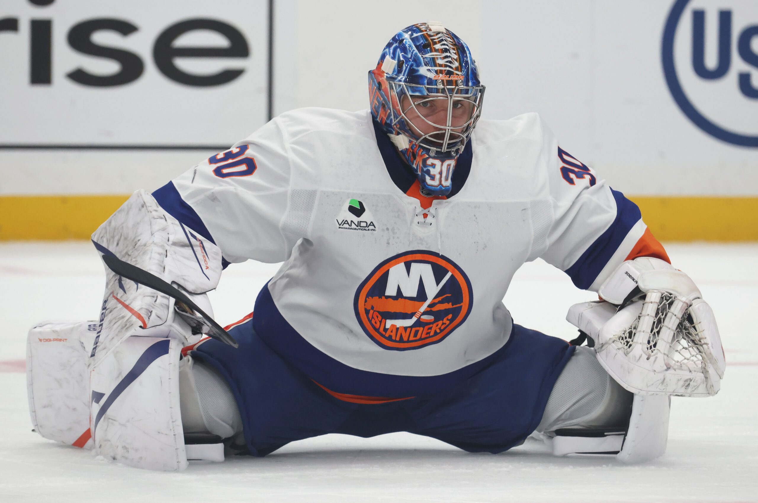 Oct 9, 2025; Pittsburgh, Pennsylvania, USA;  New York Islanders goaltender Ilya Sorokin (30) stretches on the ice during a stoppage in play against athe Pittsburgh Penguins in the first period t PPG Paints Arena. Mandatory Credit: Charles LeClaire-Imagn Images