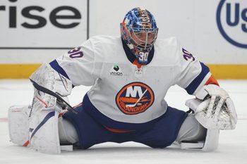 Oct 9, 2025; Pittsburgh, Pennsylvania, USA;  New York Islanders goaltender Ilya Sorokin (30) stretches on the ice during a stoppage in play against athe Pittsburgh Penguins in the first period t PPG Paints Arena. Mandatory Credit: Charles LeClaire-Imagn Images