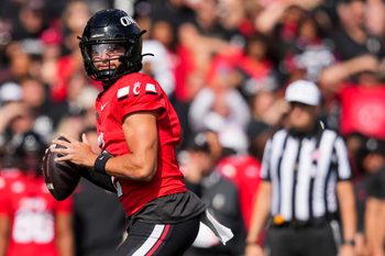 Oct 11, 2025; Cincinnati, Ohio, USA; Cincinnati Bearcats quarterback Brendan Sorsby (2) looks to pass against the UCF Knights in the first half at Nippert Stadium. Mandatory Credit: Aaron Doster-Imagn Images