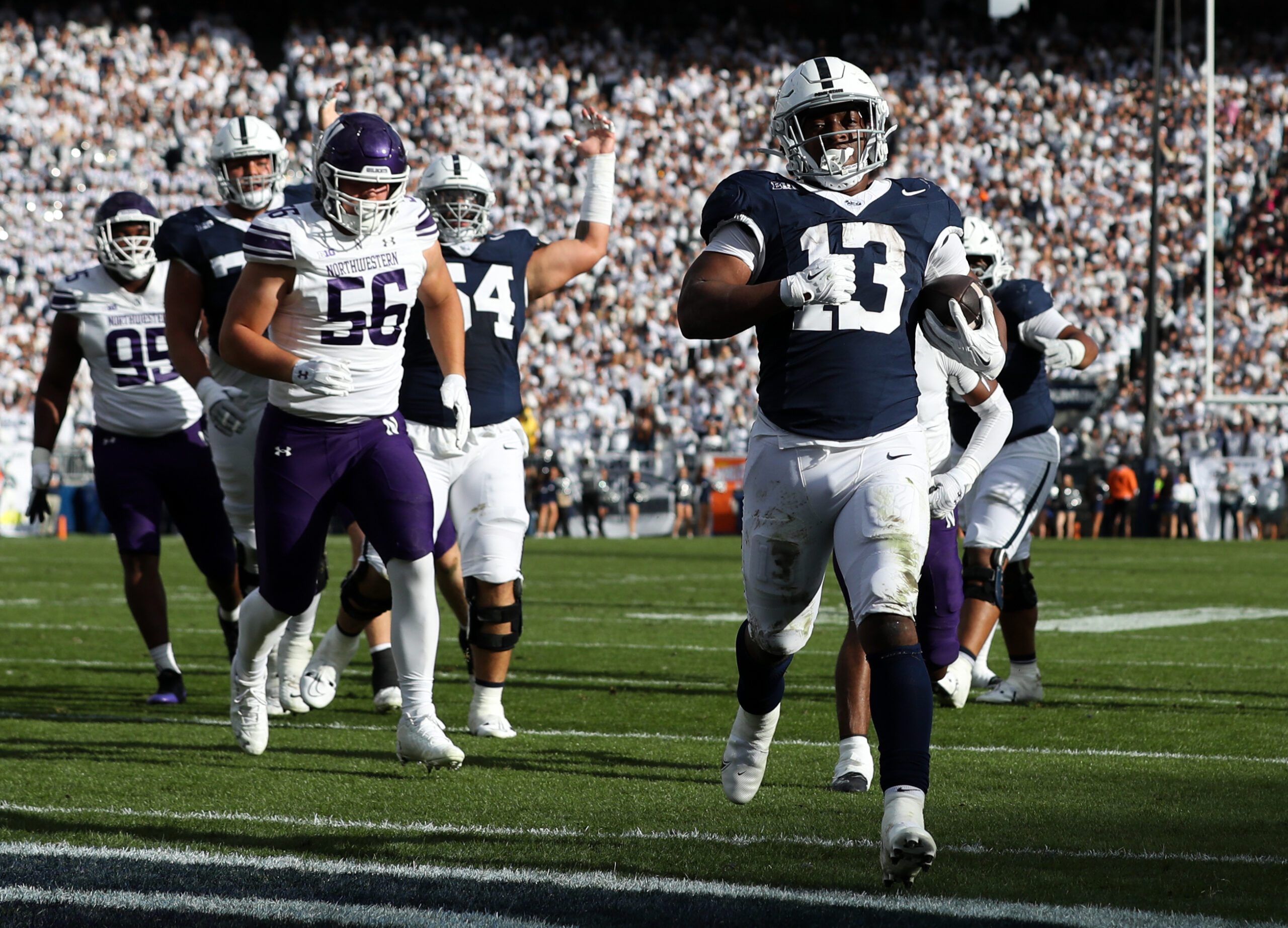 Oct 11, 2025; University Park, Pennsylvania, USA; Penn State Nittany Lions running back Kaytron Allen (13) runs the ball into the end zone for a touchdown during the second quarter against the Northwestern Wildcats at Beaver Stadium. Mandatory Credit: Matthew O'Haren-Imagn Images