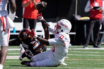 Oklahoma State Cowboys safety Kenneth Harris (23) knocks the ball away as Houston Cougars wide receiver Amare Thomas (0) misses the catch during a college football game between the Oklahoma State Cowboys (OSU) and the Houston Cougars at Boone Pickens Stadium in Stillwater, Okla., Saturday, Oct. 11, 2025. Houston won 39-17.