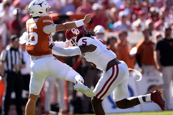 Oklahoma Sooners linebacker Kendal Daniels (5) pressures Texas Longhorns quarterback Arch Manning (16) in the first half of the Red River Rivalry college football game between the University of Oklahoma Sooners and the Texas Longhorn at the Cotton Bowl Stadium in Dallas, Texas, Saturday, Oct. 11, 2025.
