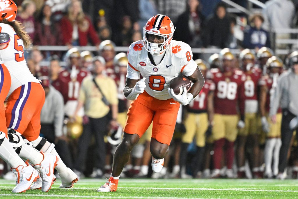 Oct 11, 2025; Chestnut Hill, Massachusetts, USA; Clemson Tigers running back Adam Randall (8) runs the ball against the Boston College Eagles during the first half at Alumni Stadium. Mandatory Credit: Eric Canha-Imagn Images