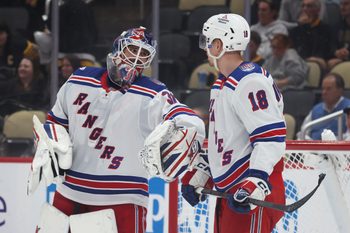 Oct 11, 2025; Pittsburgh, Pennsylvania, USA;  New York Rangers goaltender Igor Shesterkin (31) talks with defenseman Urho Vaakanainen (18) against the Pittsburgh Penguins during the third period at PPG Paints Arena. Mandatory Credit: Charles LeClaire-Imagn Images
