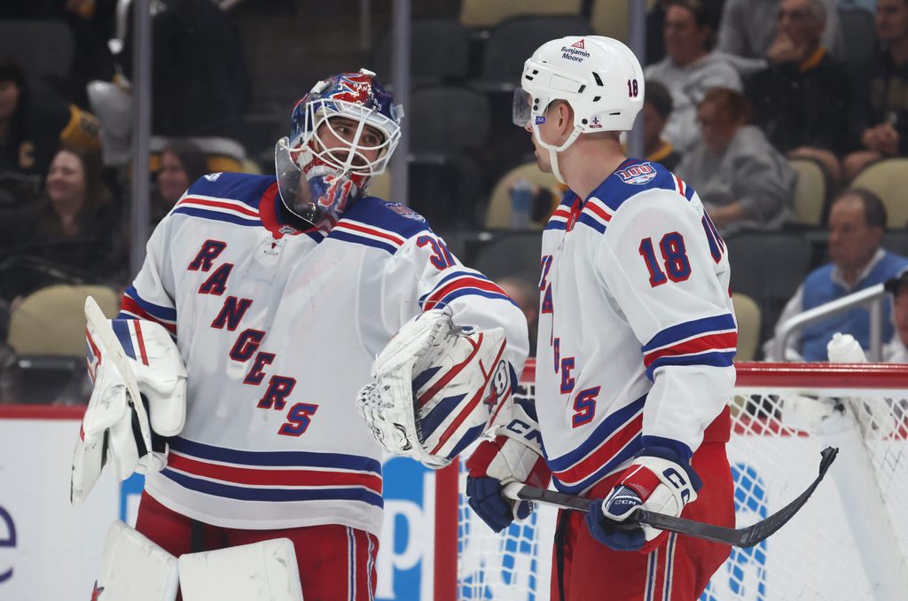 Oct 11, 2025; Pittsburgh, Pennsylvania, USA; New York Rangers goaltender Igor Shesterkin (31) talks with defenseman Urho Vaakanainen (18) against the Pittsburgh Penguins during the third period at PPG Paints Arena. Mandatory Credit: Charles LeClaire-Imagn Images